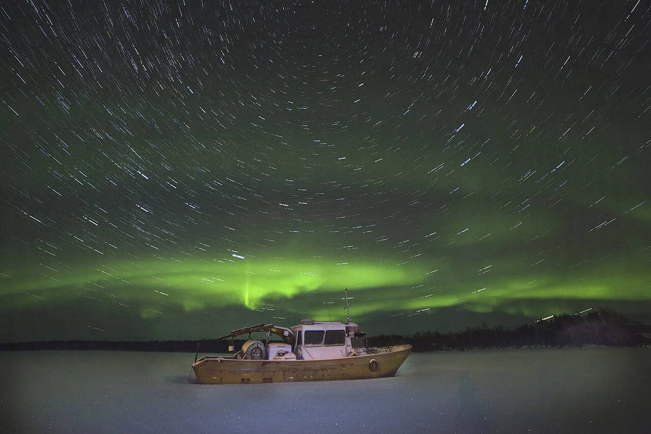 Star trail over frozen Lake Inari