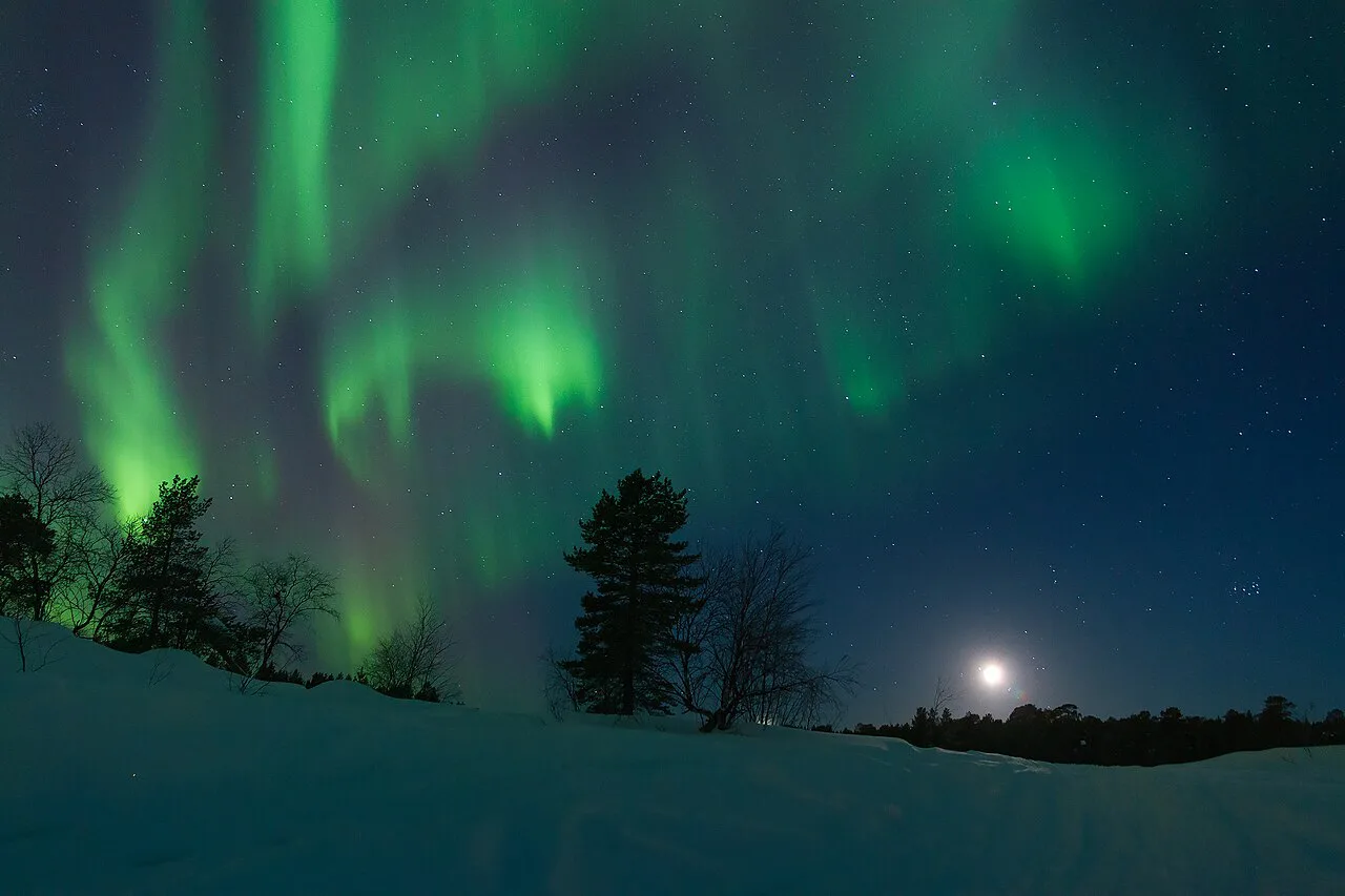 Multiple rays of northern lights above Vuopajanniemi, Inari, Lapland, Finland, March